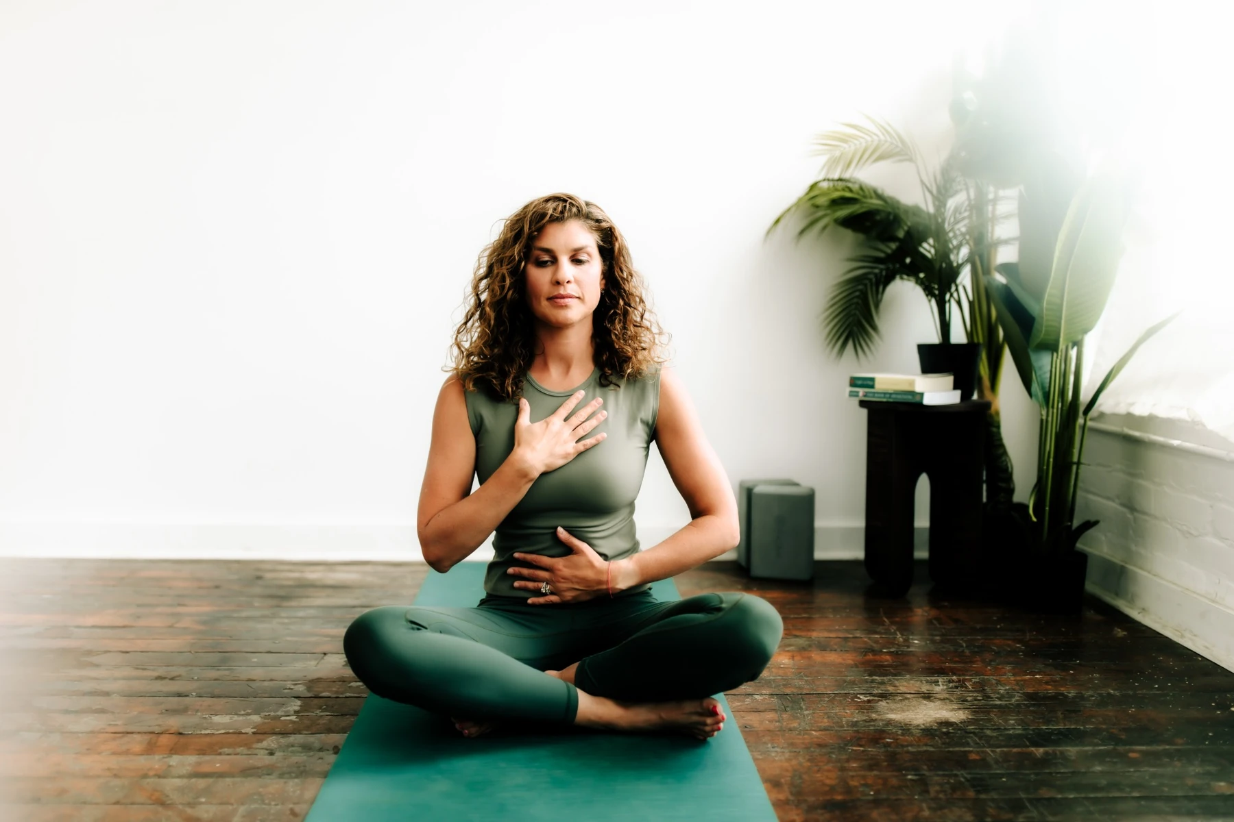 Rachel Krall seated in a bright studio