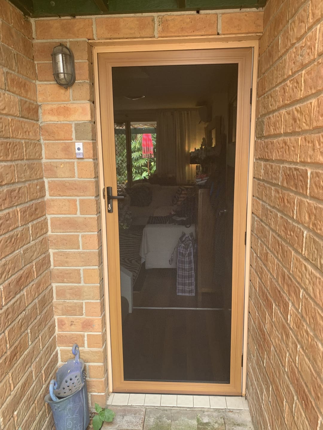 Stainless steel mesh security door fitted to residential front door