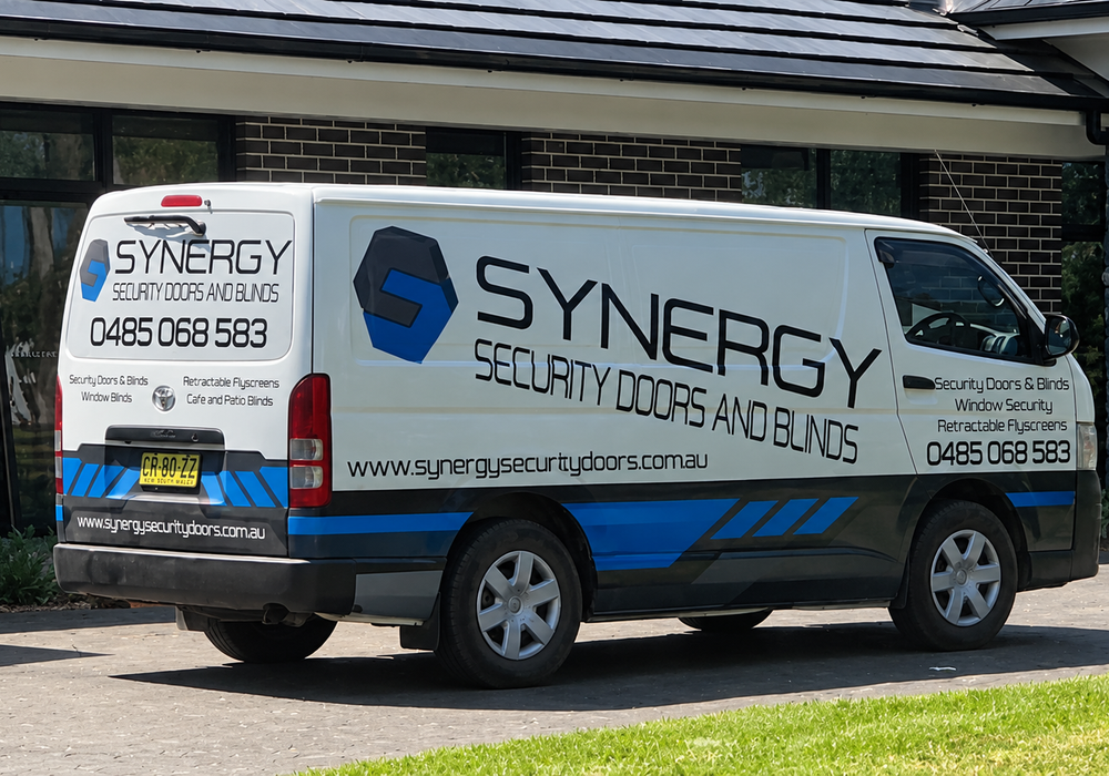 Synergy Security Doors & Blinds service vehicle and team on-site
