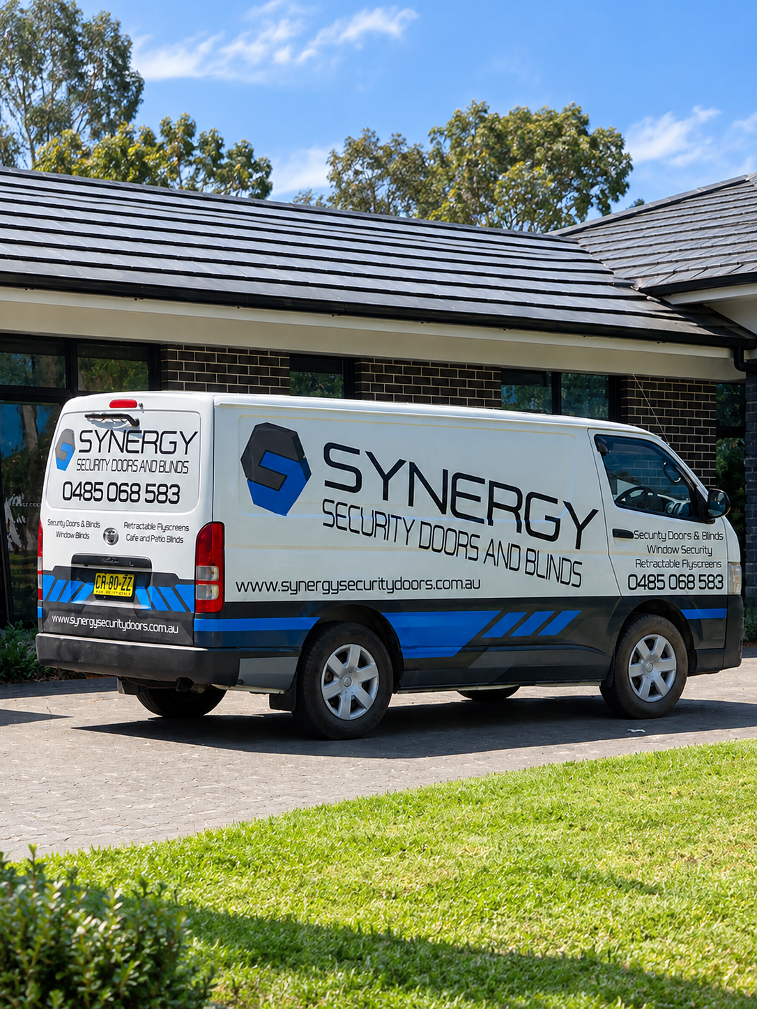 Synergy Security Doors & Blinds service van parked on-site