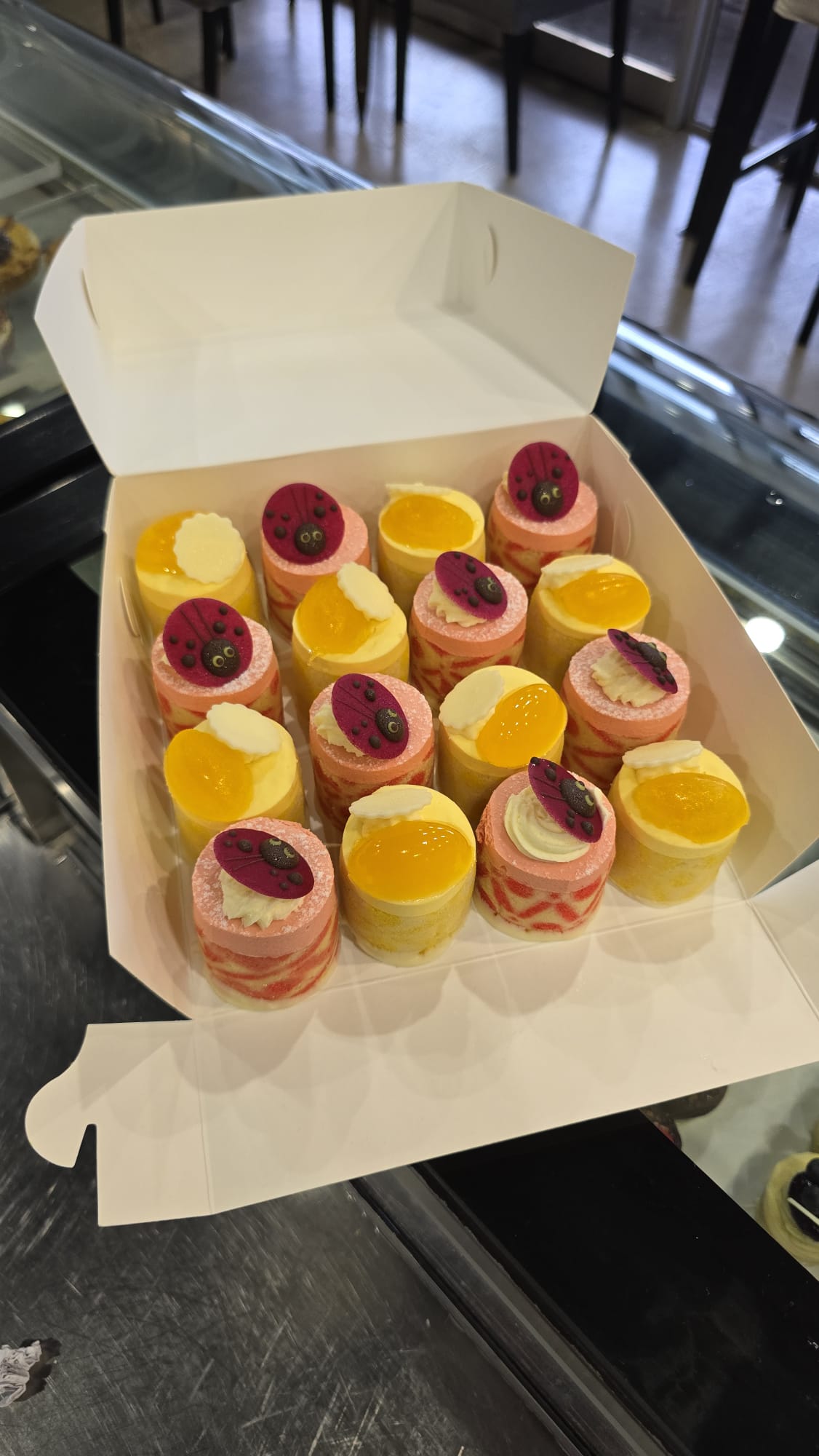 Open box of Madders Brothers petit fours
