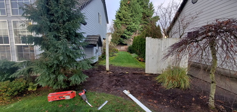 Old fence tear-out, post replacement and site preparation
