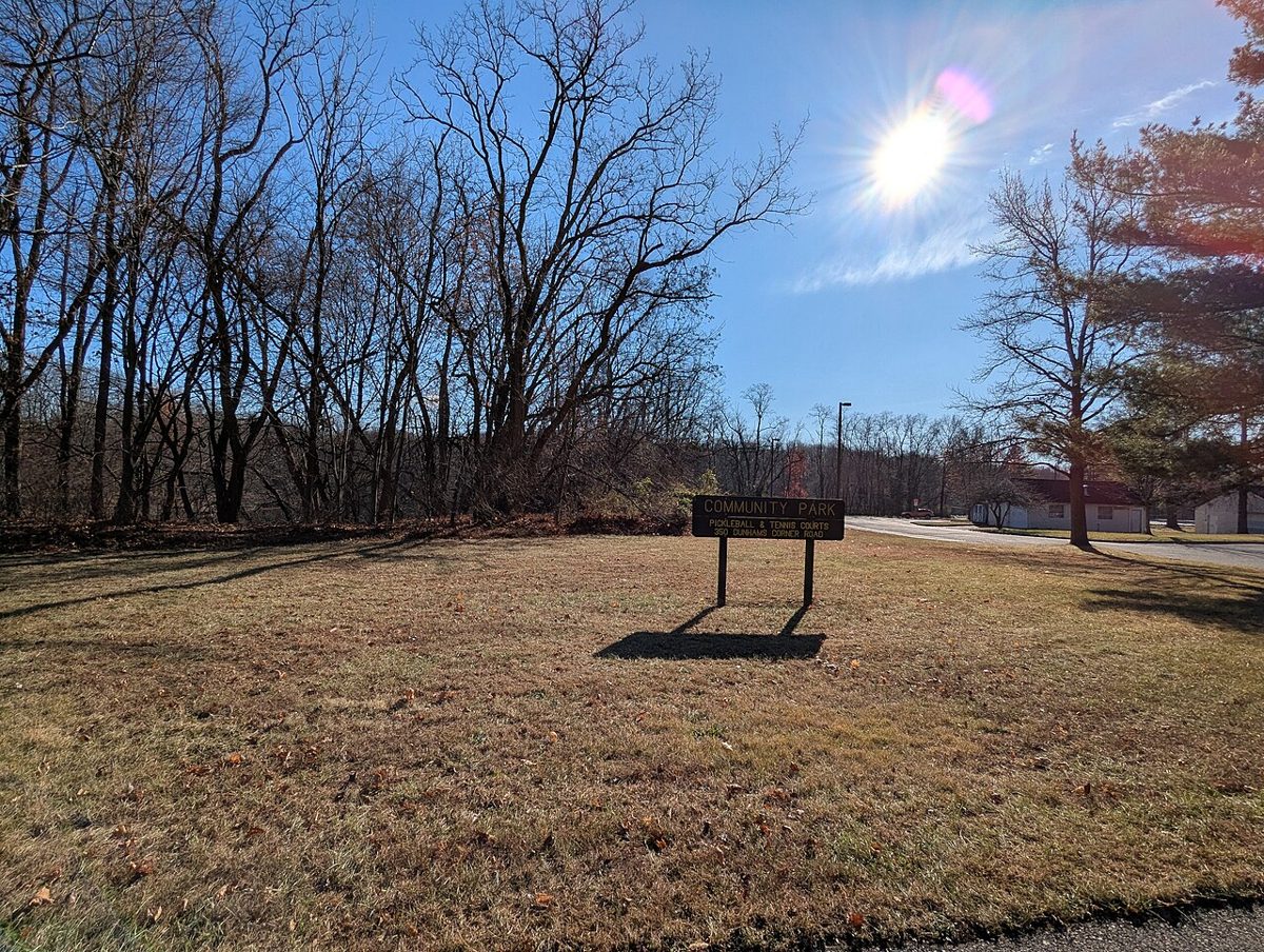 East Brunswick Community Park grounds and courts sign