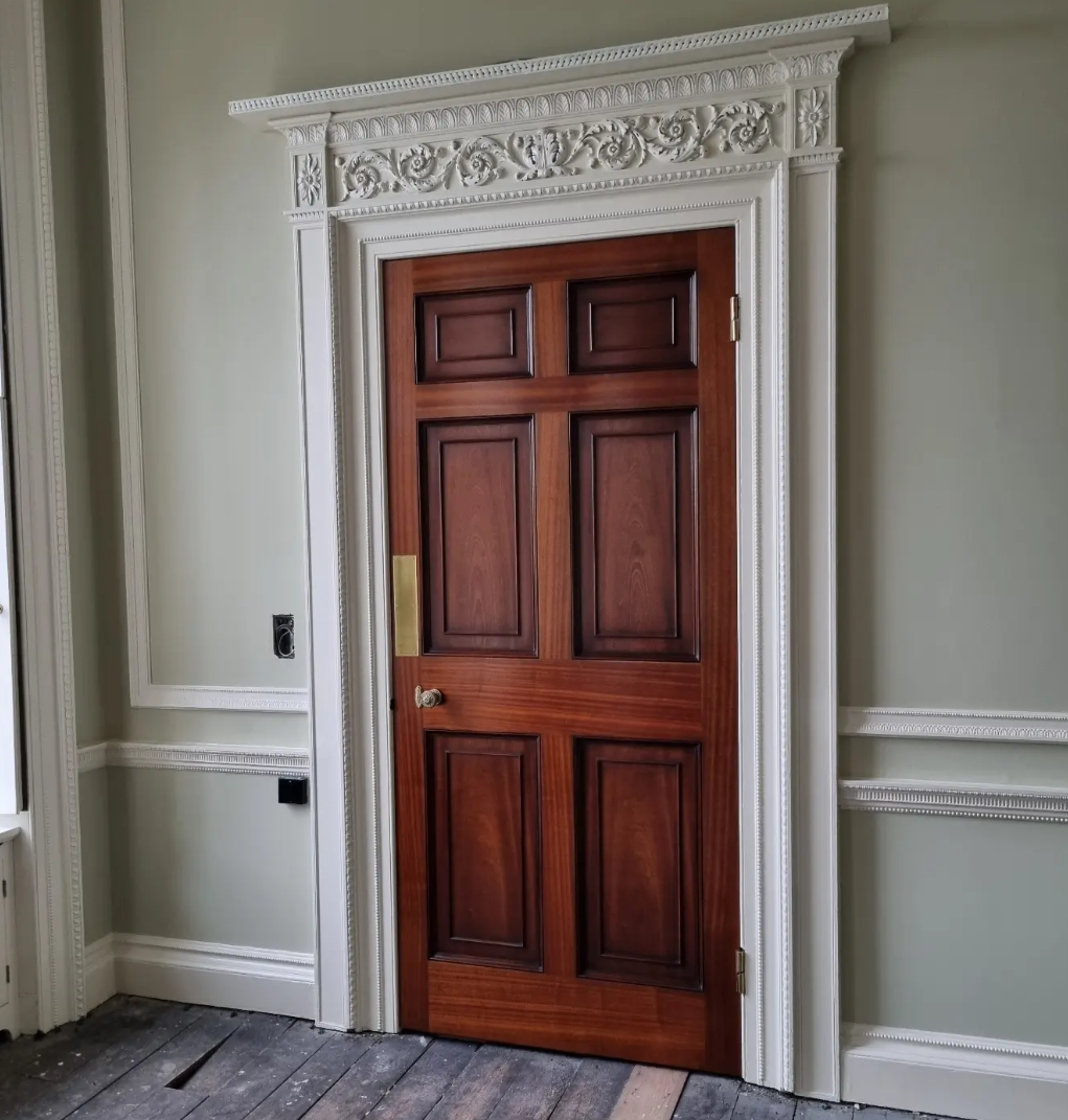 Classical Hardwood Door & Ornate Architrave