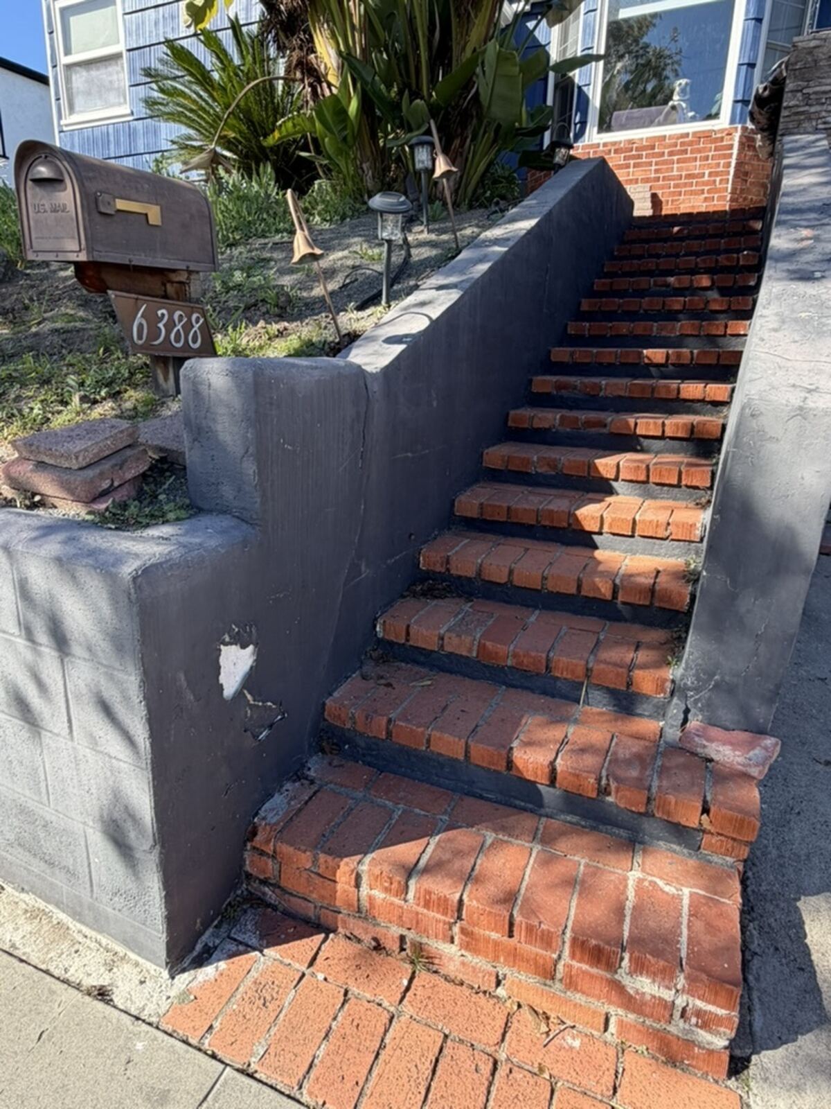 Before Stucco repair and paint, stairway entry