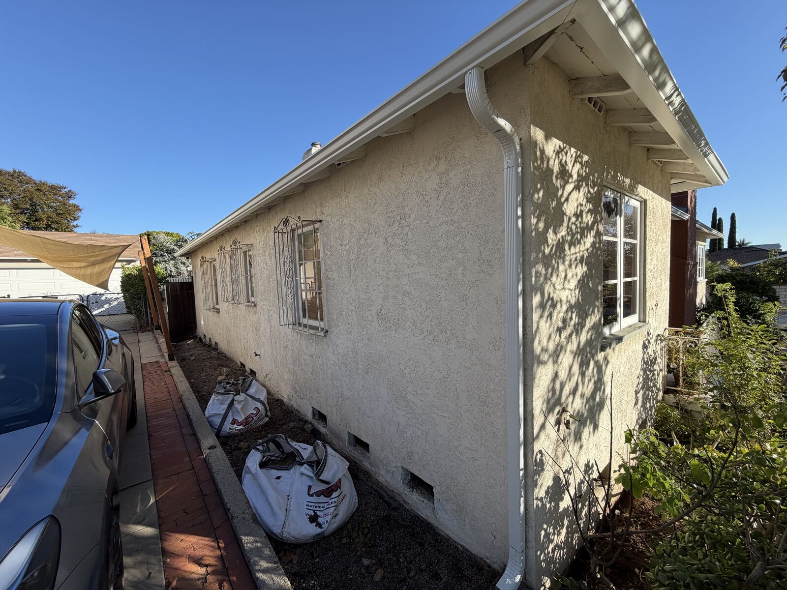 Before Exterior stucco renovation