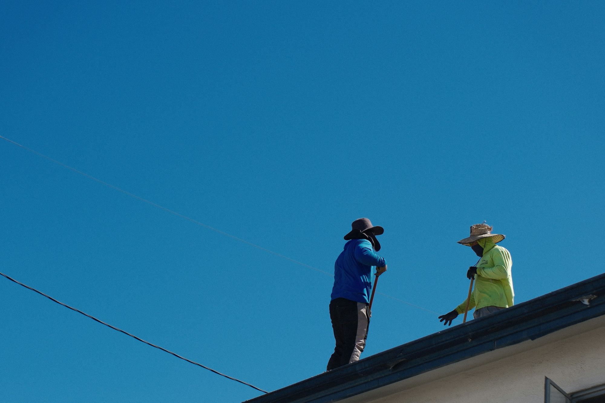 Kenneth Thompson Inspecting Roof