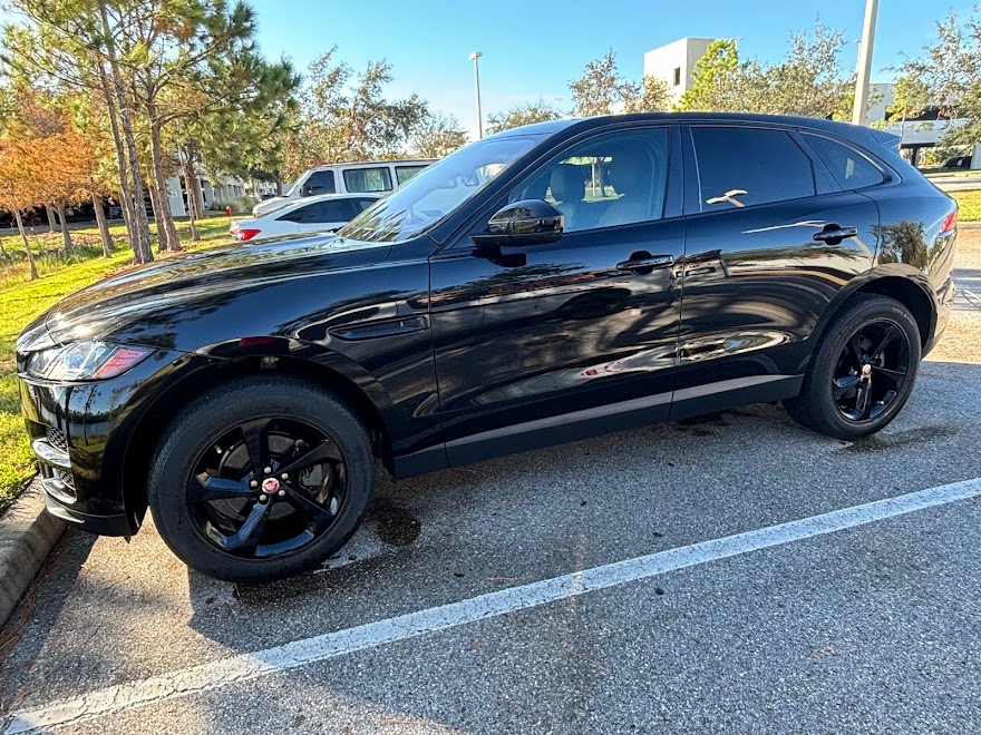 Aamer's completed high-gloss mirror finish detailing on an SUV