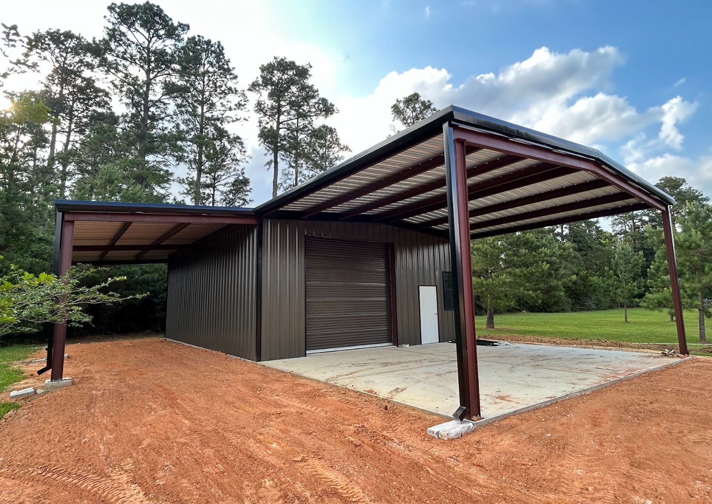 Heavy-duty red iron open canopy and attached enclosed garage