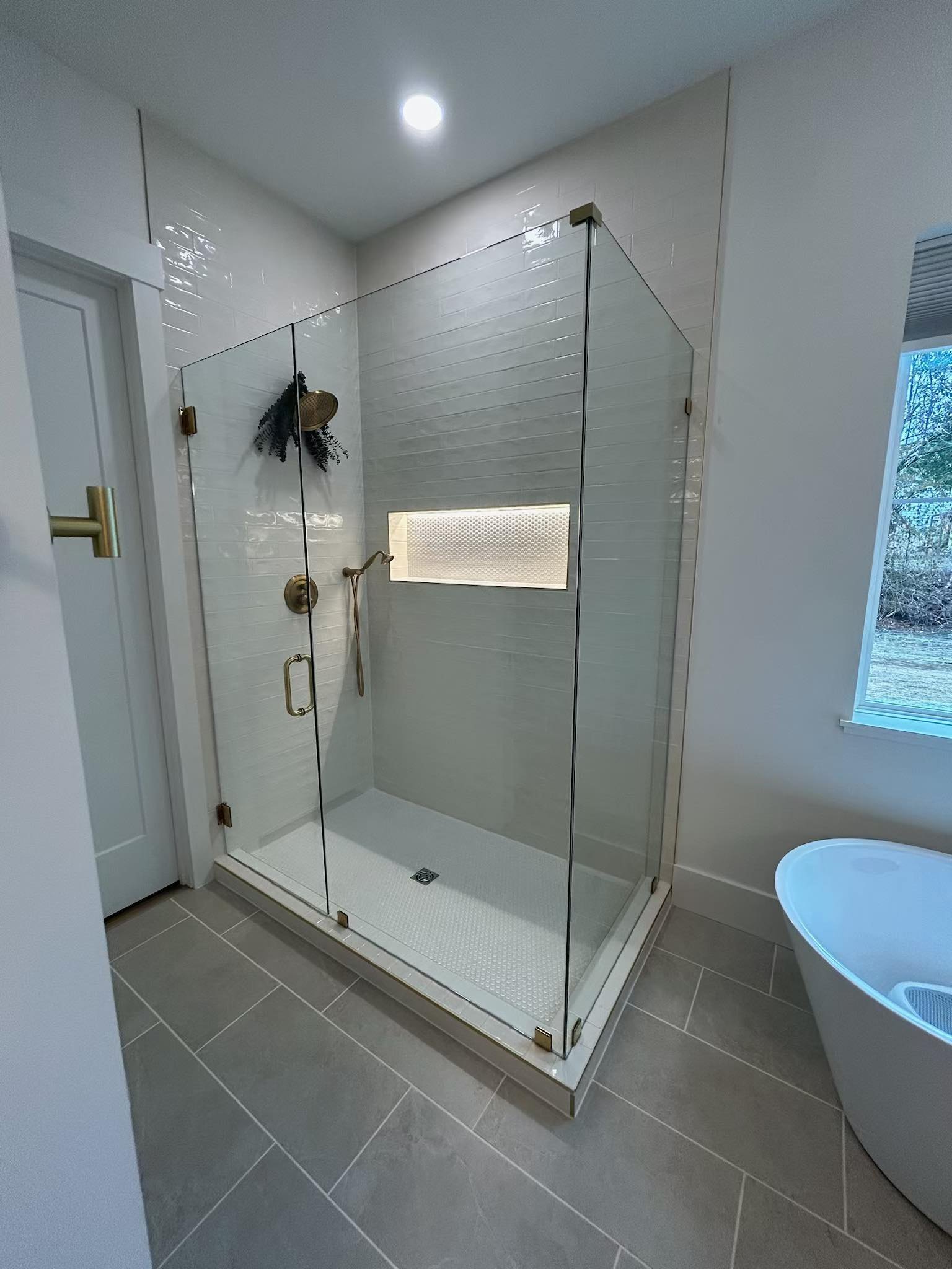 Custom glass shower door with sleek hardware
