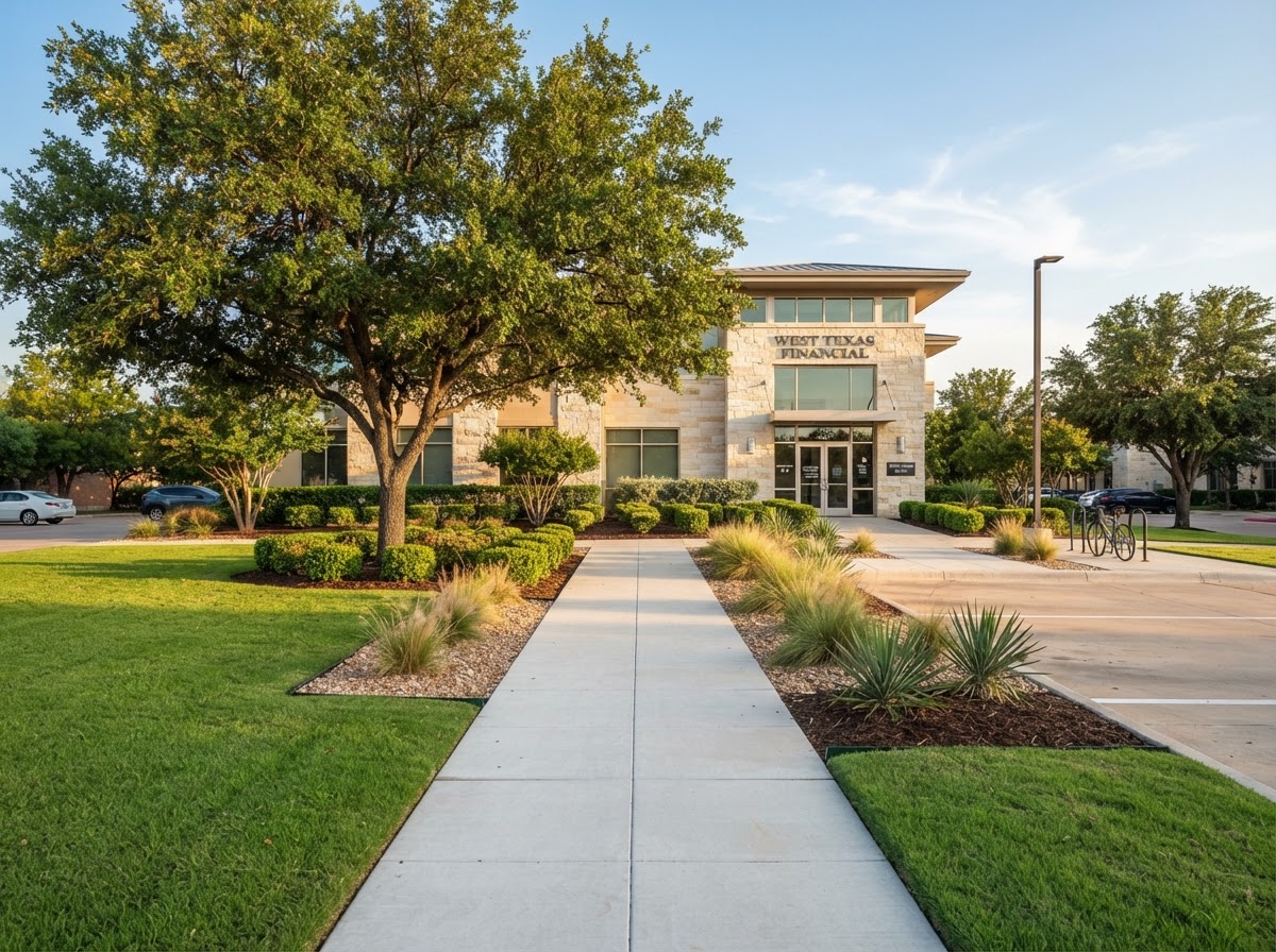 Maintained commercial landscaping with trimmed shrubs, mulch and clean walkways typical of Odessa Texas properties
