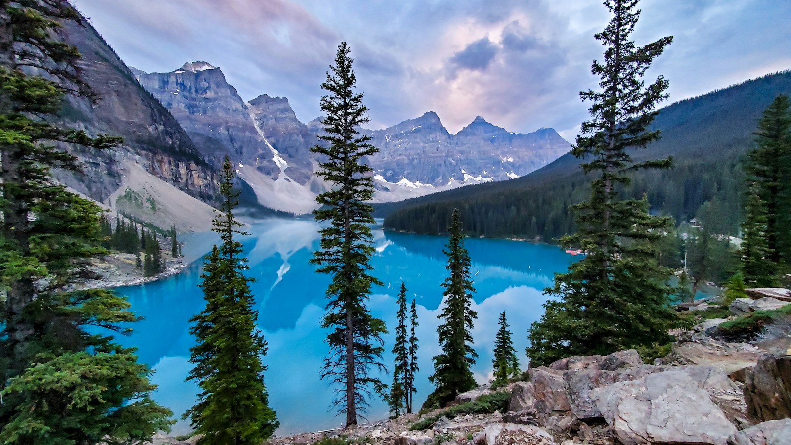 Turquoise lake surrounded by mountains