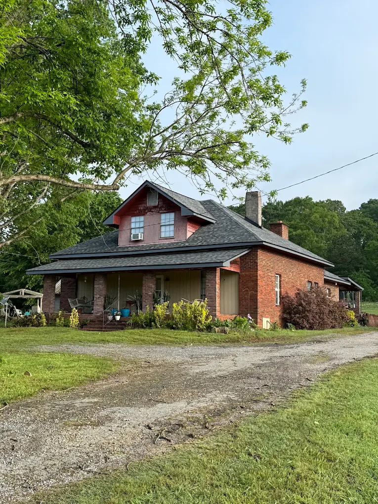 Complete roof replacement on residential brick home by McCullough Roofing