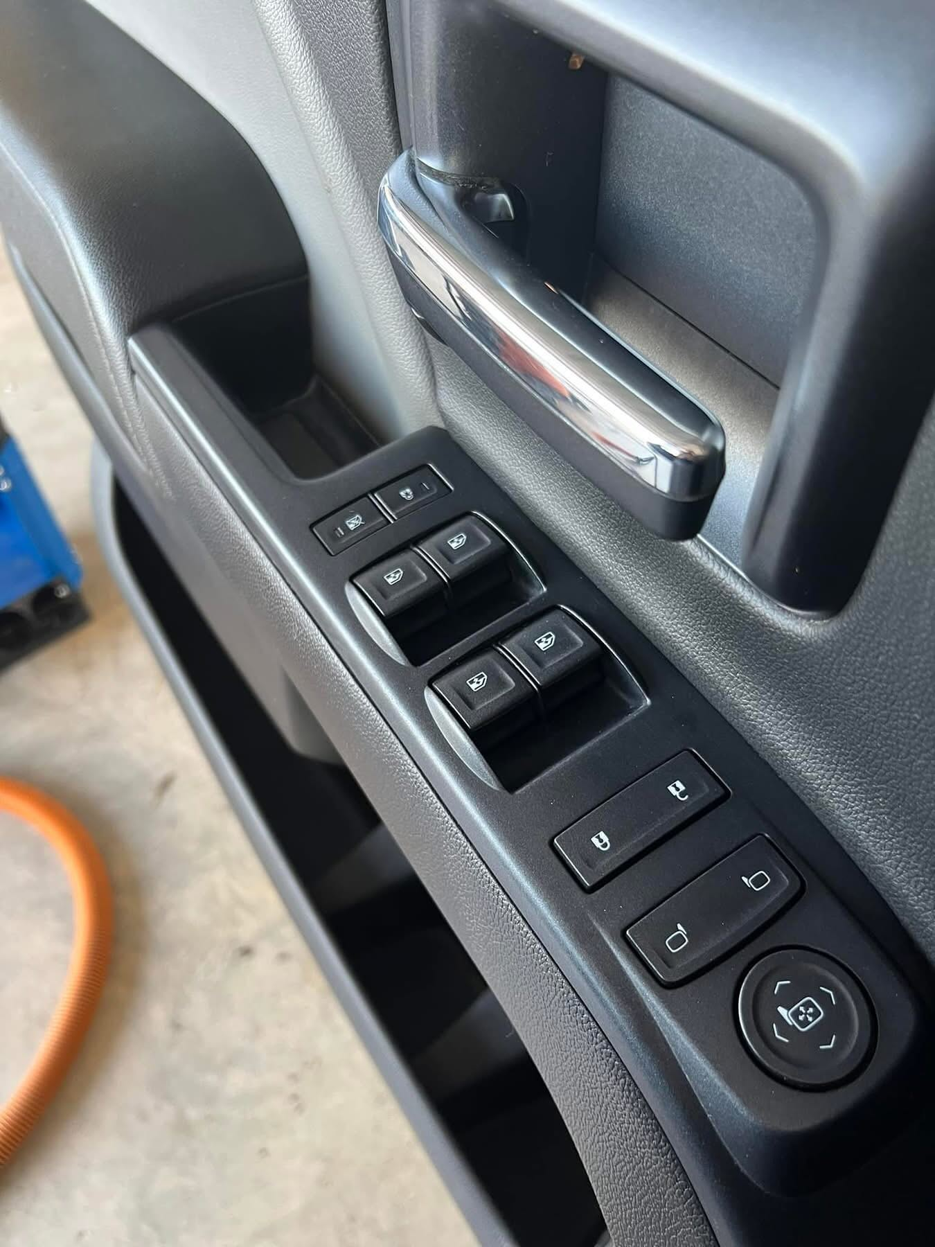Vehicle door controls and trim after interior cleaning