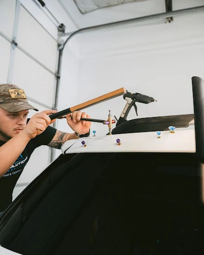 Technician Using Specialized PDR Tools