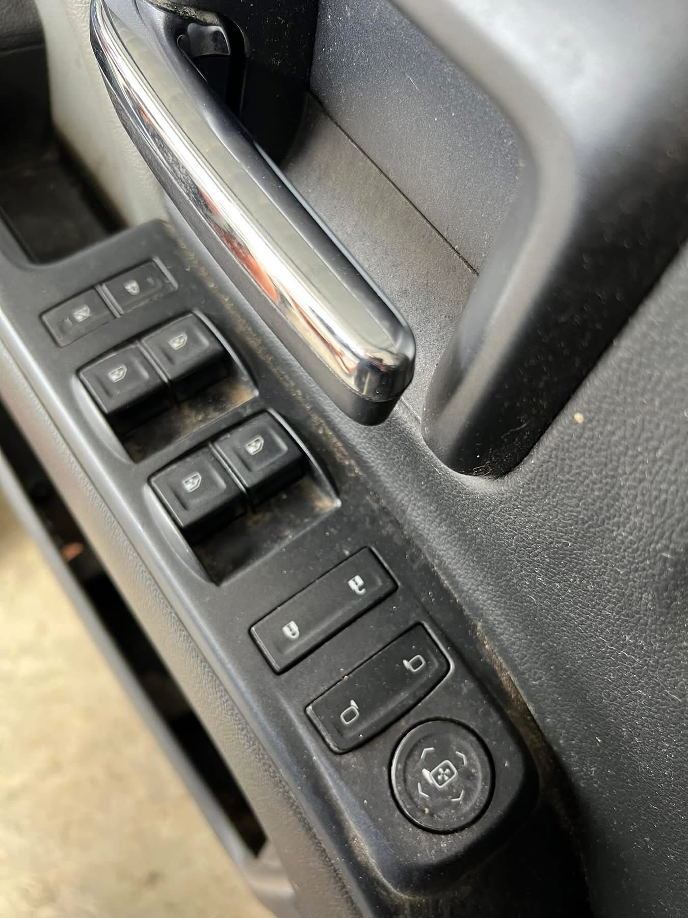 Vehicle door controls and trim before interior cleaning