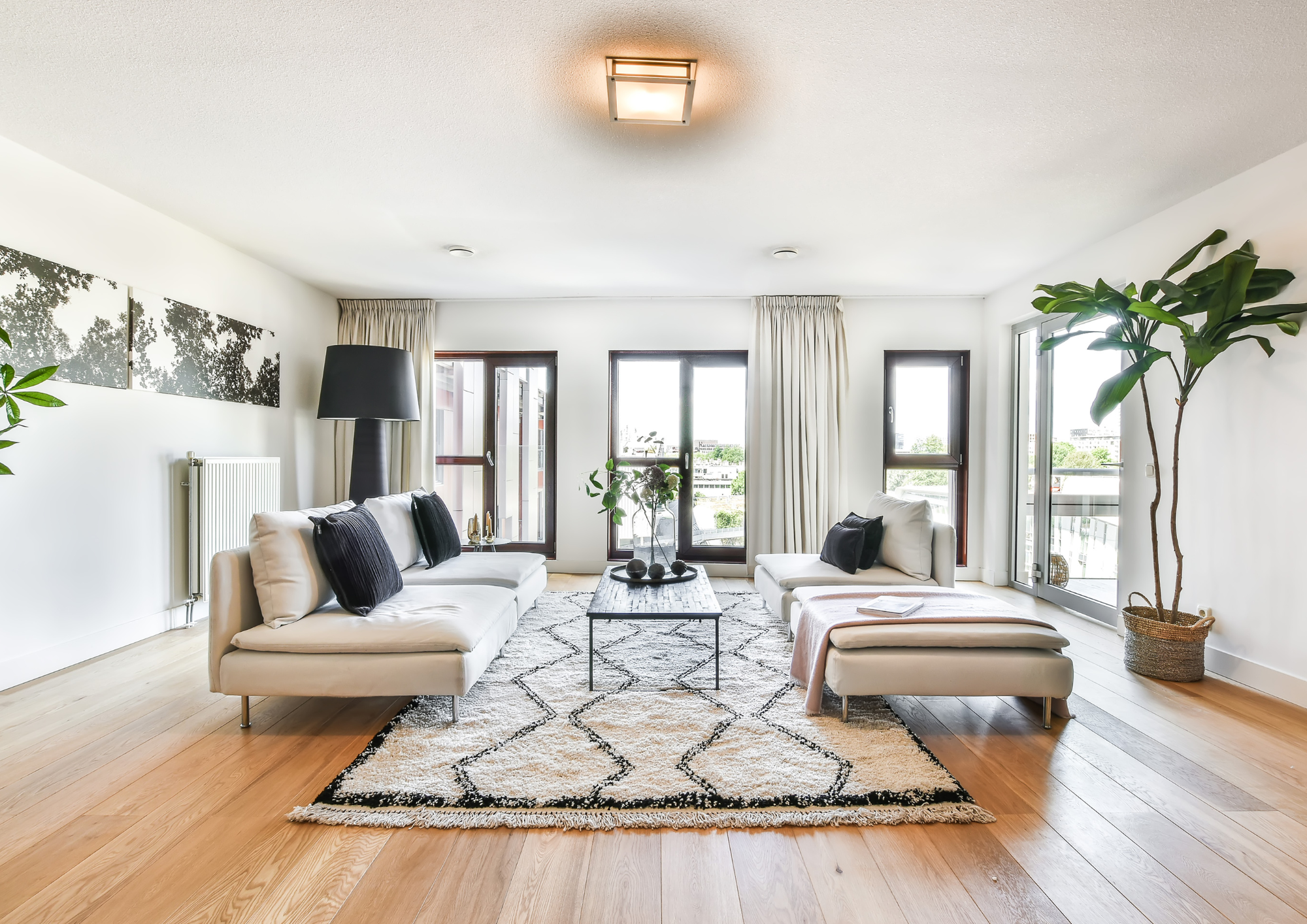 Bright modern interior living room representing homeownership