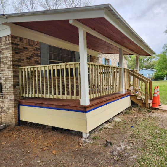 Covered Porch with Wood Plank Ceiling by Protech Decks in Tillmans Corner