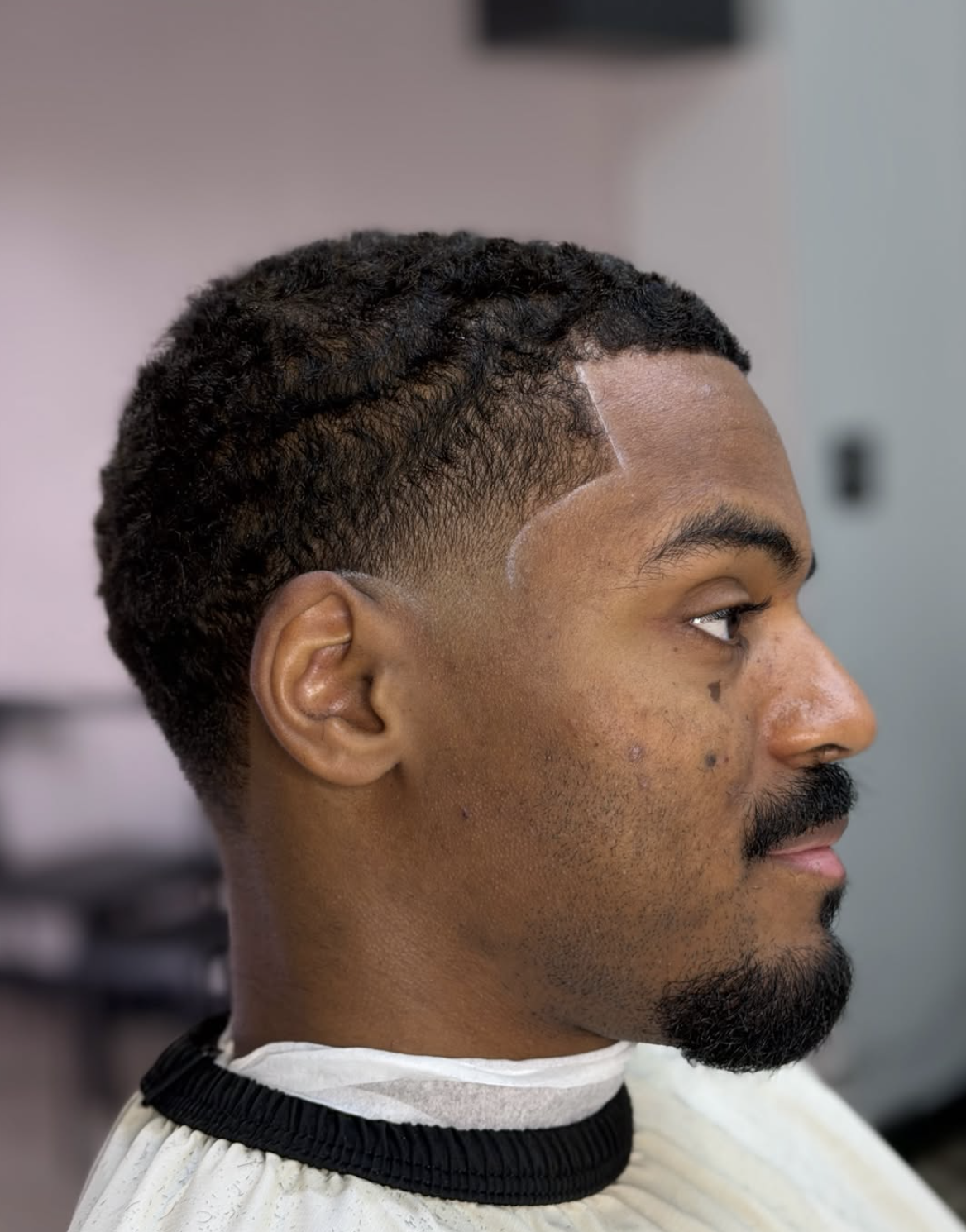 Crisp wave texture and razor line up at 22nd Street Barber Lounge