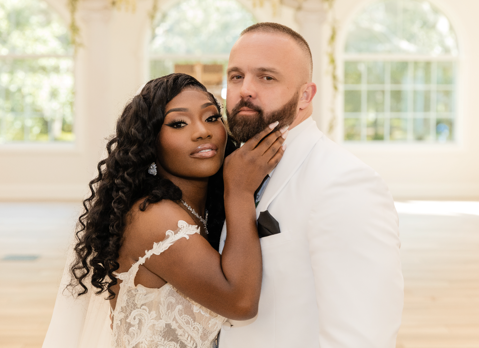 Coach Ryan and Coach Roxy - An intimate, loving wedding portrait