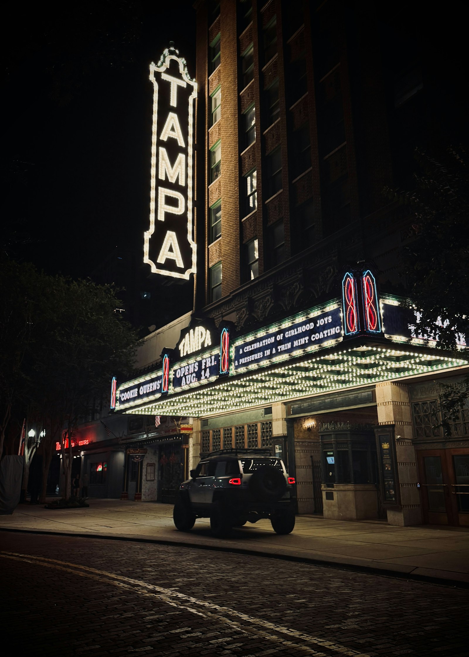 Historic illuminated Tampa Theatre marquee and Downtown Tampa cultural district