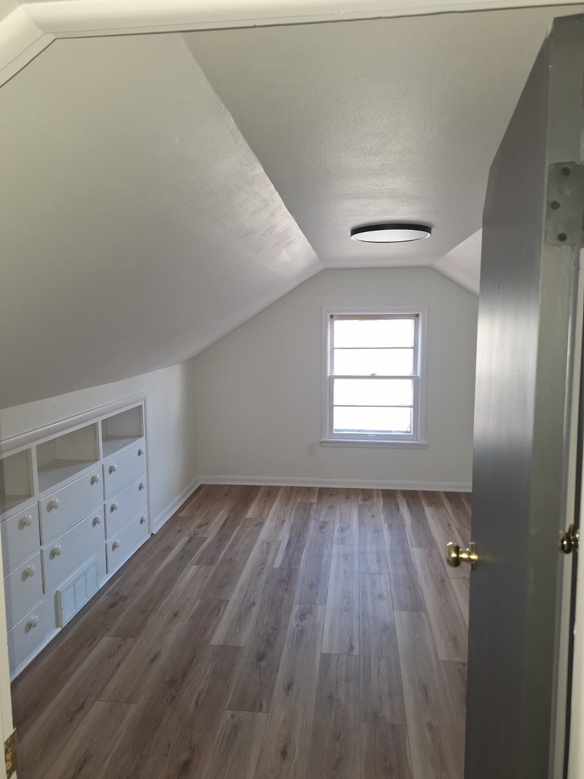 Attic Room with Custom Built-In Storage