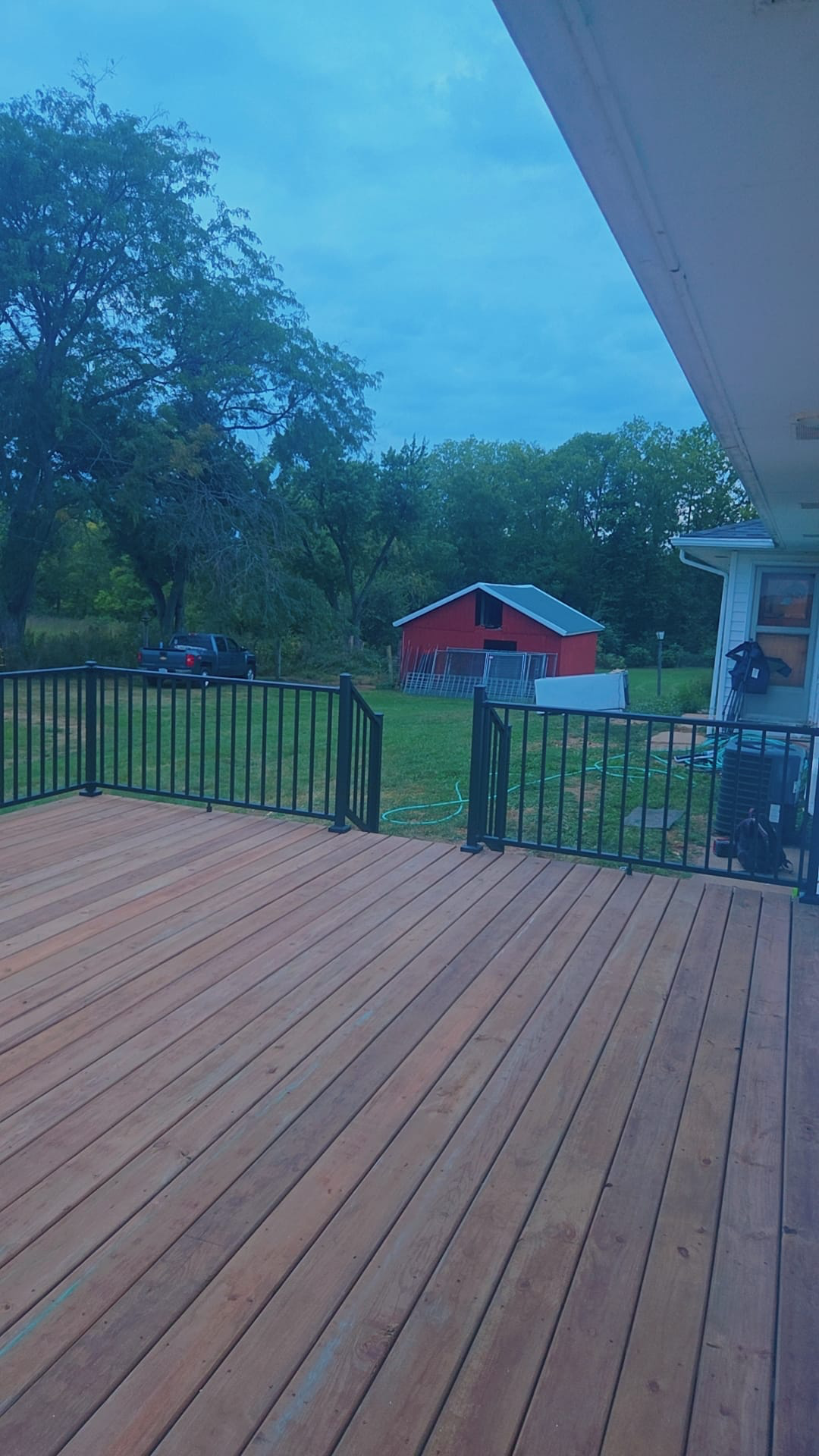 Custom Natural Wood Deck with Black Railing