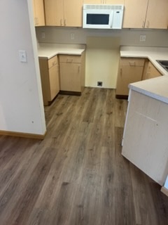 Plank kitchen floor installed by American Flooring LLC near Madison, WI