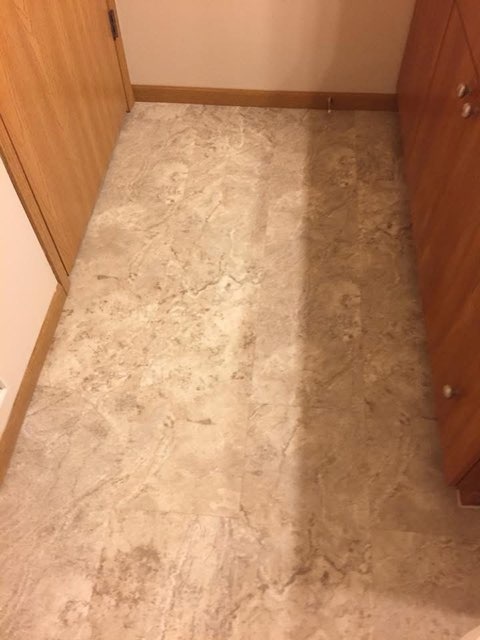 Stone look floor installed by American Flooring LLC