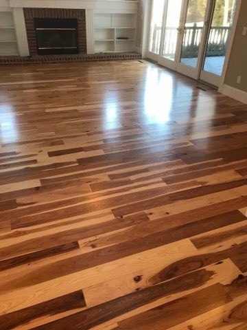 Hickory hardwood living room floor installed by American Flooring LLC