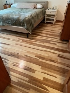 Hickory hardwood bedroom floor installed by American Flooring LLC