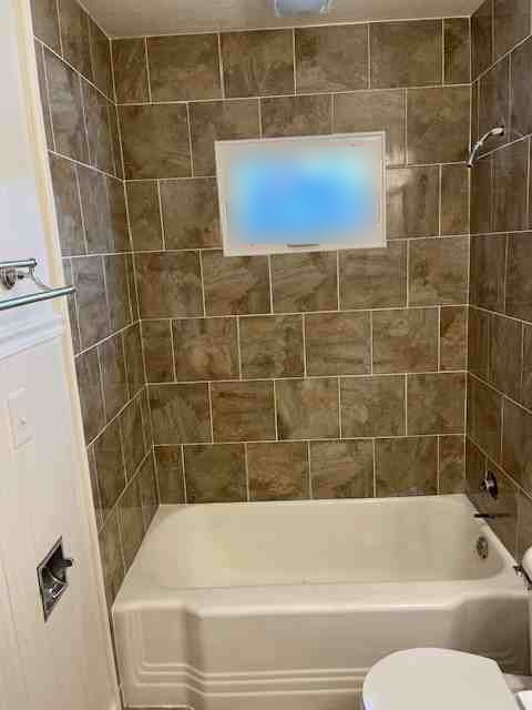 Tile tub surround installed by American Flooring LLC
