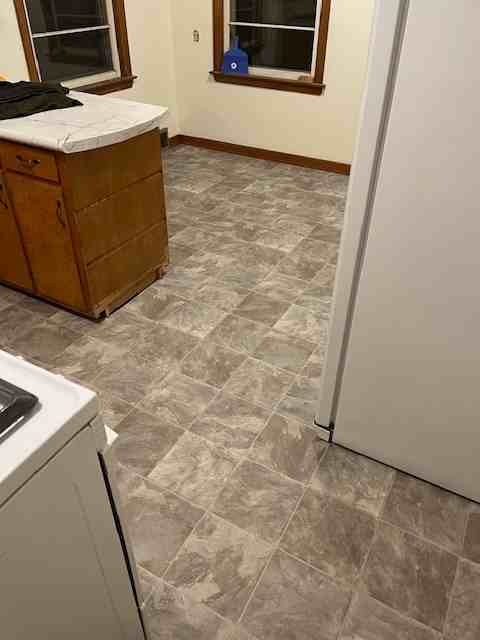 Kitchen floor installed by American Flooring LLC