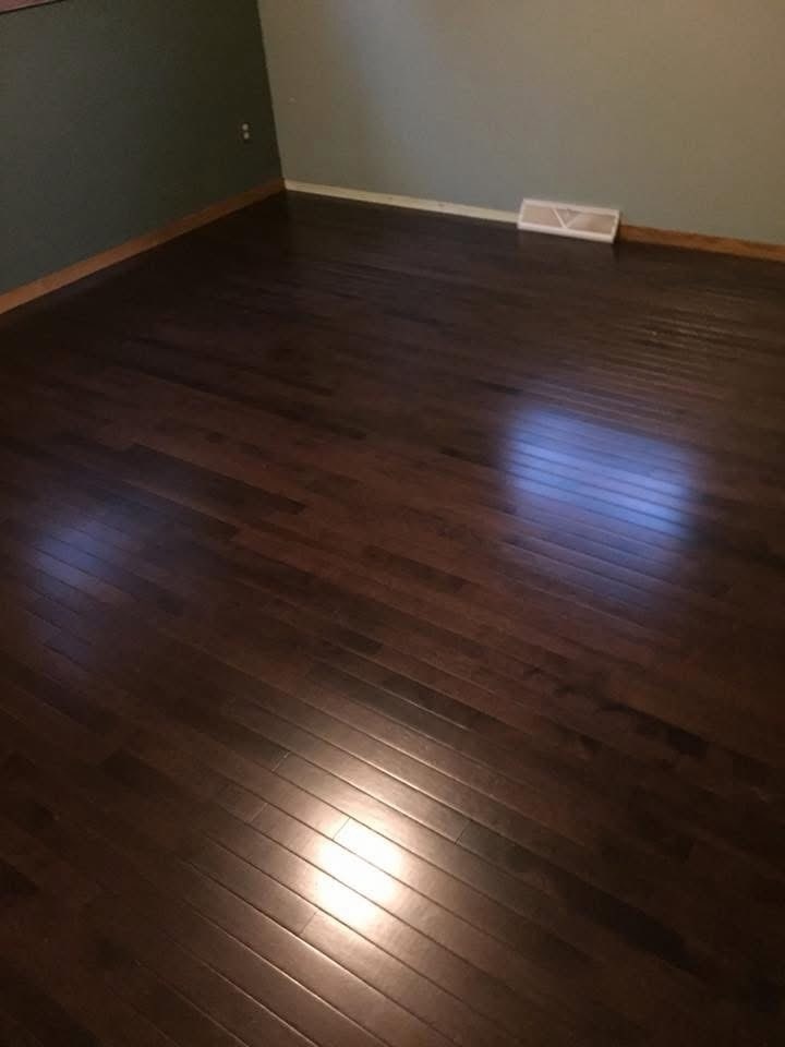 Dark hardwood floor installed by American Flooring LLC