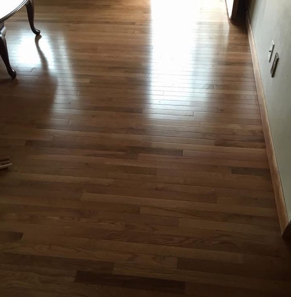 Oak hardwood hallway floor installed by American Flooring LLC in the Sun Prairie, WI area