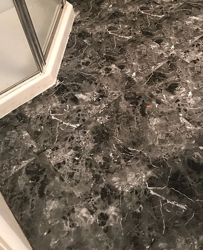 Bathroom floor installation by American Flooring LLC