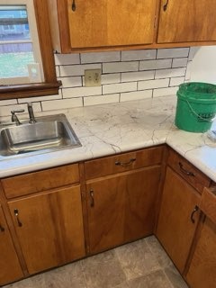 Subway tile kitchen backsplash installed by American Flooring LLC