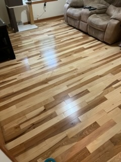 Hickory hardwood living room floor installed by American Flooring LLC in the Sun Prairie, WI area