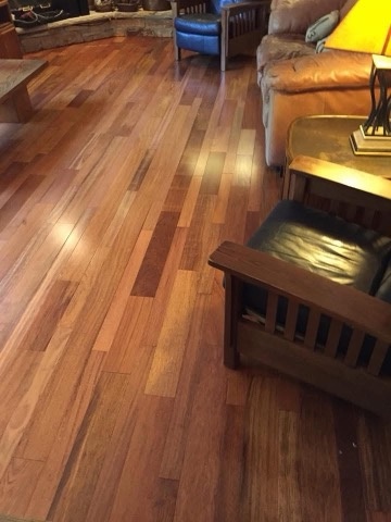Hardwood living room floor installed by American Flooring LLC