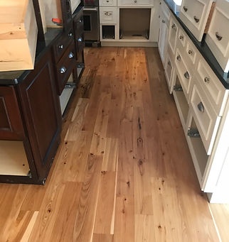 Kitchen hardwood floor installation by American Flooring LLC near Madison, WI