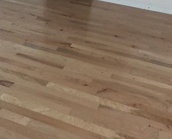 New hardwood floor installed by American Flooring LLC in a Wisconsin home