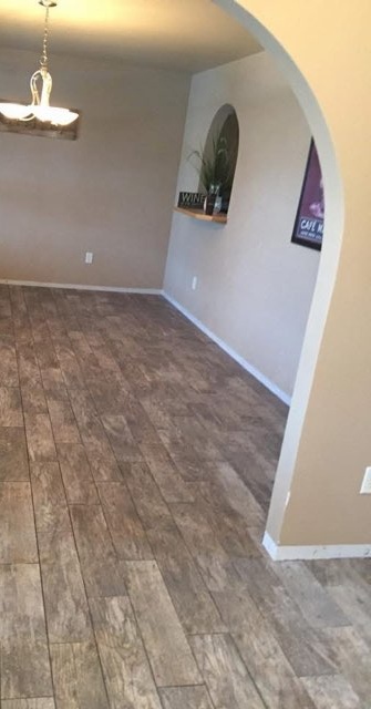 Wood look plank dining room floor installed by American Flooring LLC