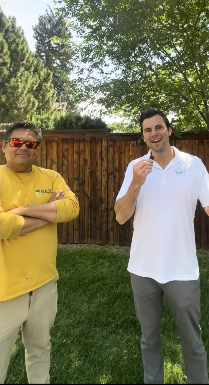 Summit Systems owner Jack on-site with a local landscaping contractor