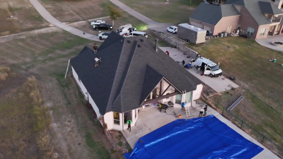 Completed impact-resistant roofing system on a North Texas estate home