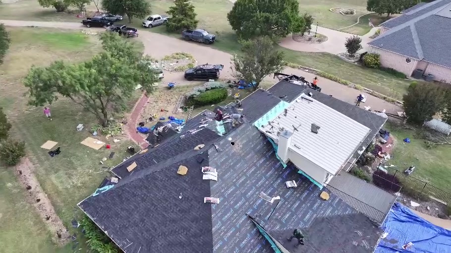 Roof installation underway during a DFW storm restoration project