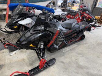Reconditioned snowmobile on the showroom floor at Al's Snowmobile Parts Warehouse