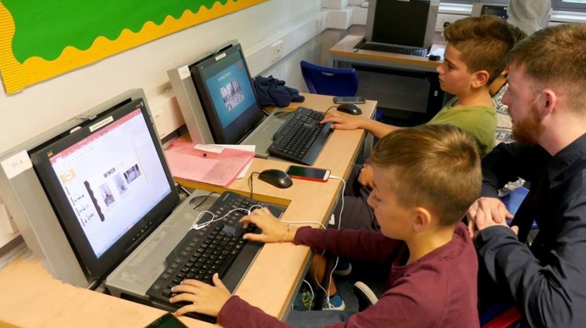 Teacher leading interactive English lesson in classroom