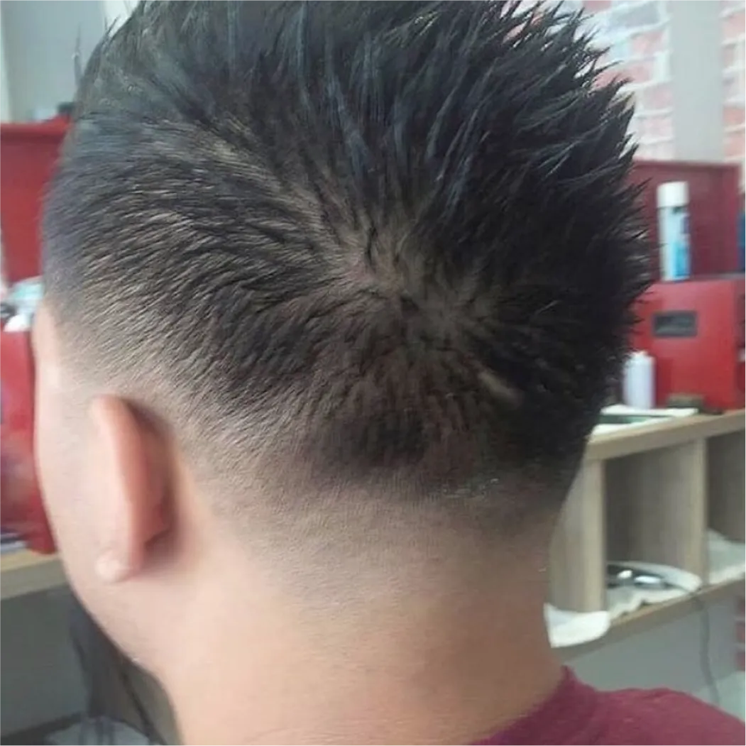 Spiky textured low drop fade haircut at Spartan Baracks East York