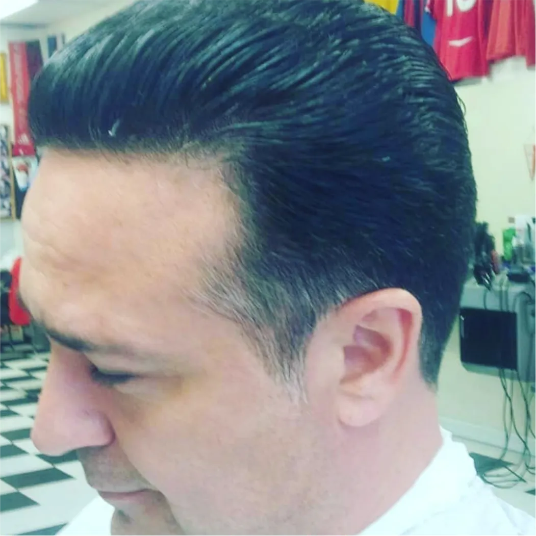 Tailored men's haircut by barber in East York Toronto