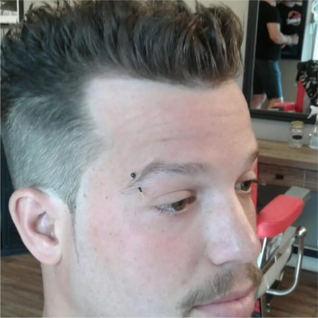 Razor-Etched Eyebrow & Textured Top by barber at Spartan Baracks in East York Toronto